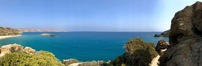 Panoramic view of bay against sky