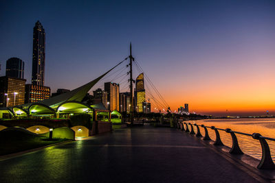 City at seaside during dusk