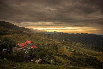 Scenic view of landscape against sky during sunset