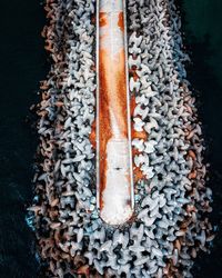 High angle view of rusty hanging on table