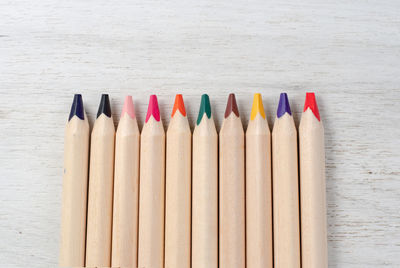 High angle view of colored pencils on table