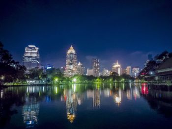 Illuminated city at waterfront