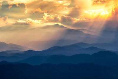 Scenic view of mountains against sky during sunset