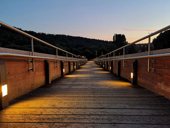 Empty footbridge against clear sky at sunset in lugo, galicia, spain