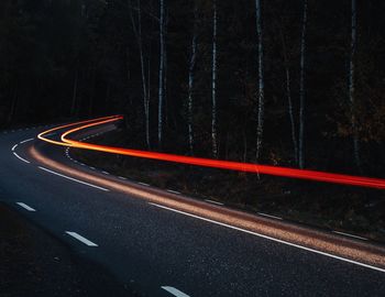 Light trails on road at night
