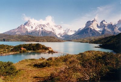 Scenic view of lake against cloudy sky