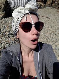 Portrait of young man wearing sunglasses