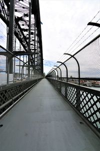 Bridge against sky in city