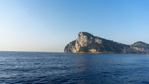 Scenic view of sea against clear sky