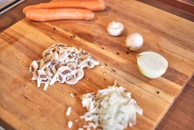 High angle view of chopped bread on cutting board