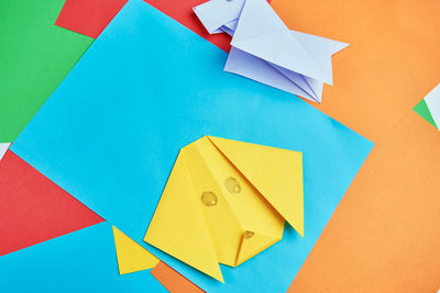 Origami paper dog on table