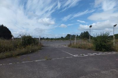 Empty road against sky