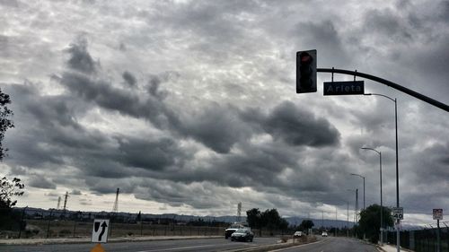 Road against cloudy sky