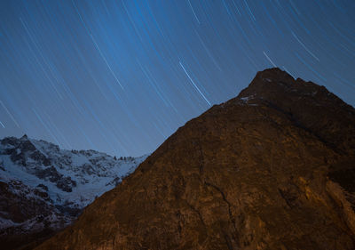 Star trail in la fouly switzerland with a view from the swiss alps mountains