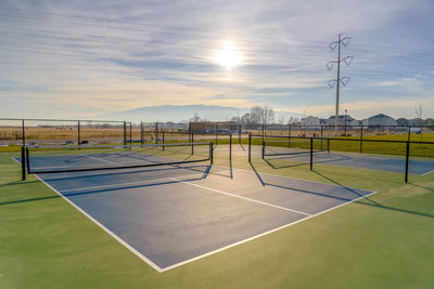 Scenic view of soccer field against sky