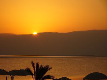 Scenic view of mountains at sunset