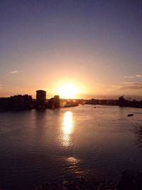 Scenic view of sunset over river