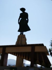 Low angle view of statue against clear sky