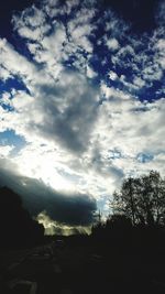 Silhouette trees against sky