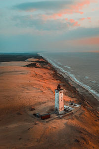 High angle view of lighthouse at beach