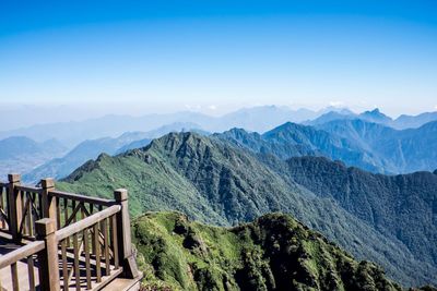 Scenic view of mountains against clear blue sky