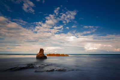 Scenic view of sea against sky during sunset