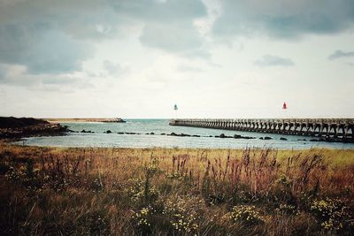 Scenic view of beach against sky