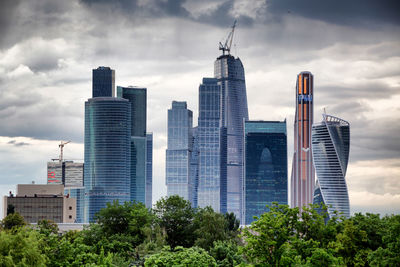 View of buildings against cloudy sky. moskva-city