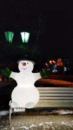Illuminated lanterns in city at night