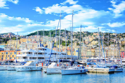 Boats moored at harbor