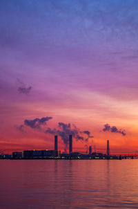 Scenic view of sea against sky during sunrise.