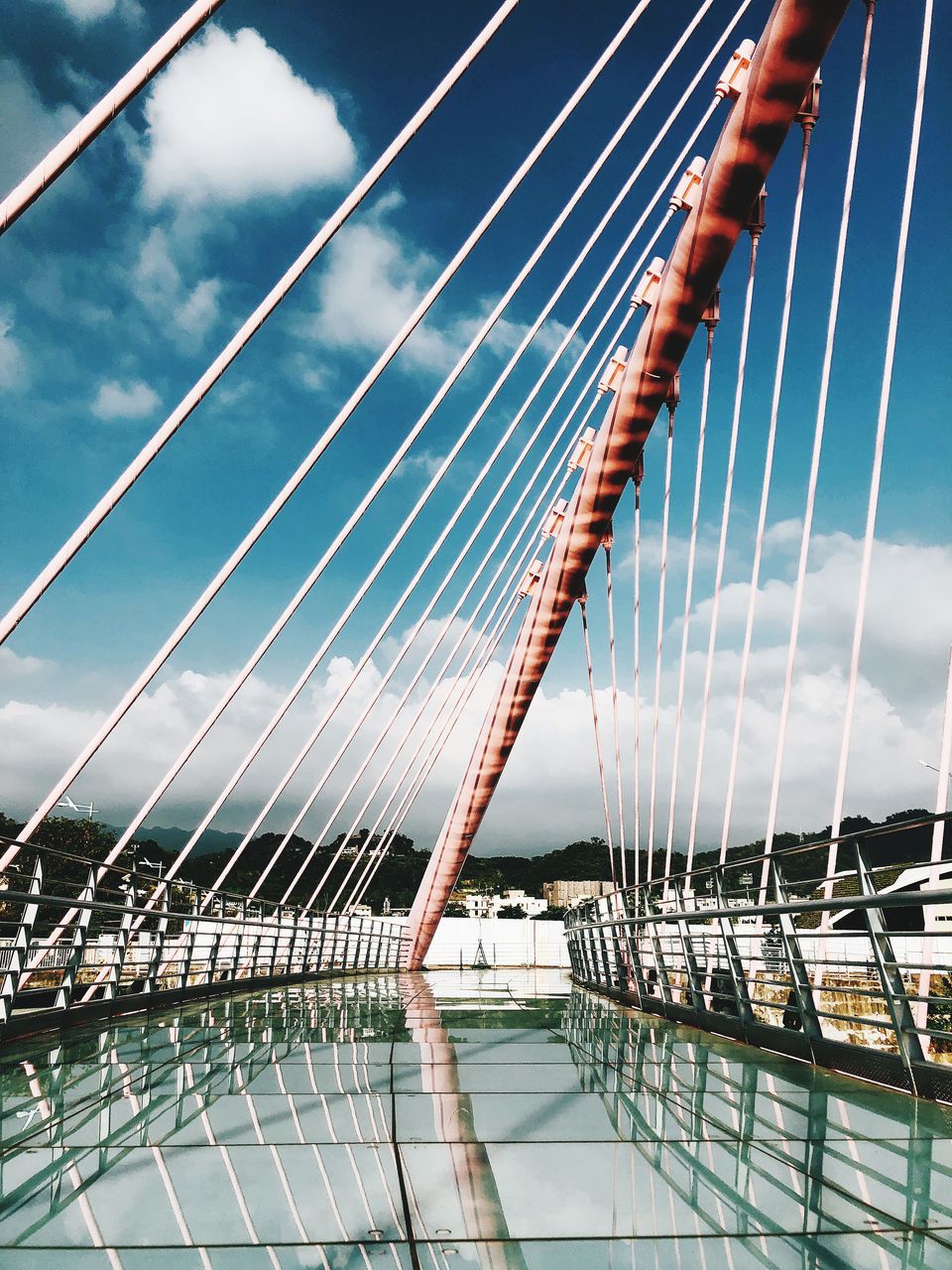 cloud - sky, sky, nature, transportation, bridge, water, bridge - man made structure, day, no people, connection, sea, travel, mode of transportation, built structure, outdoors, suspension bridge, rope, architecture, low angle view, sailboat