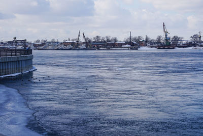 Scenic view of sea against sky during winter