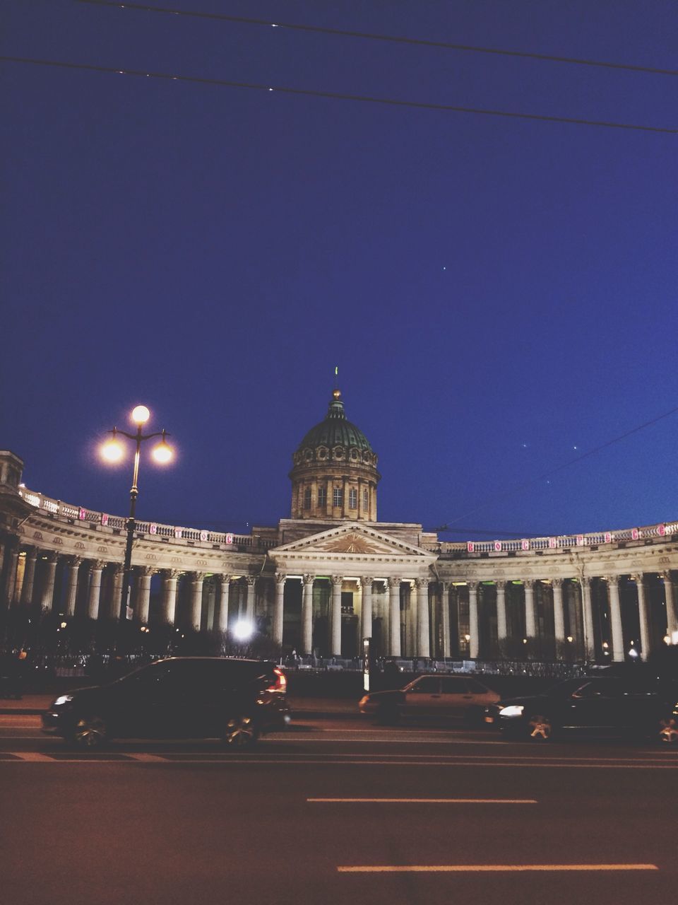 architecture, built structure, building exterior, famous place, travel destinations, travel, international landmark, clear sky, history, tourism, dome, road, transportation, capital cities, illuminated, street, blue, city, low angle view, night