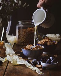 High angle view of person preparing food on table