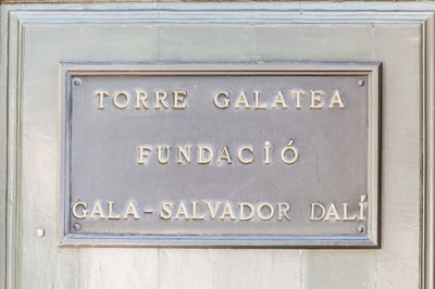 Close-up of text on wall