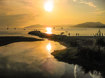 Scenic view of sea against sky during sunset