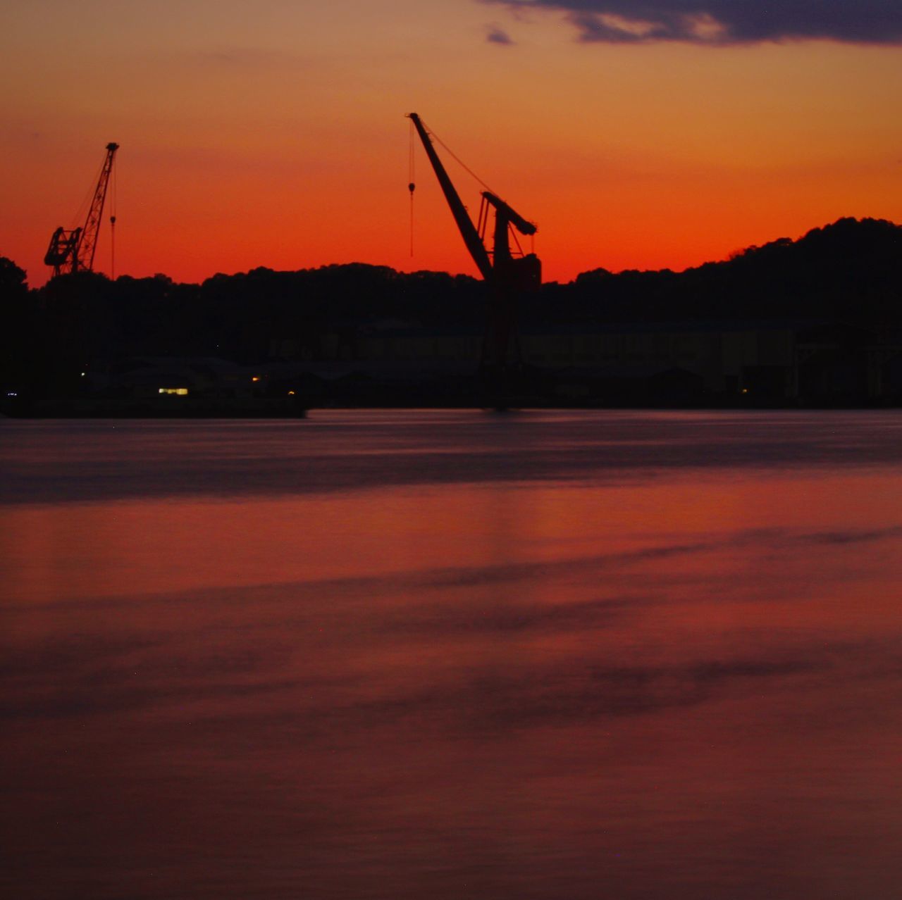 sunset, sky, water, silhouette, orange color, transportation, no people, beauty in nature, crane - construction machinery, nature, cloud - sky, scenics - nature, waterfront, sea, machinery, construction industry, tranquil scene, outdoors, mode of transportation, construction equipment