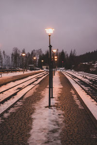 Street light against sky