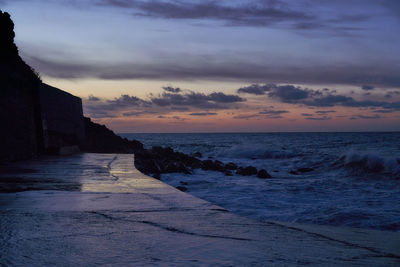 Scenic view of sea against sky at sunset