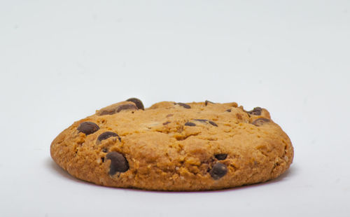 Close-up of cookies against white background