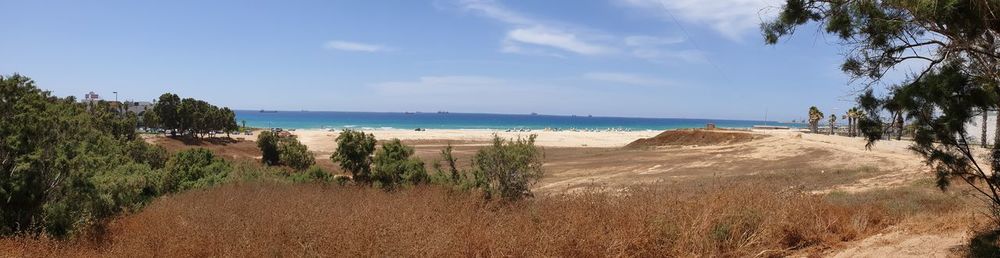 Scenic view of beach against sky