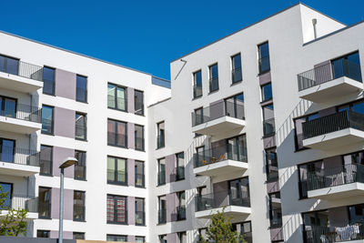 Recently built white multi-family house seen in berlin, germany