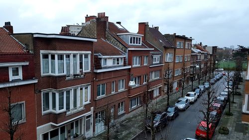 View of residential buildings against sky