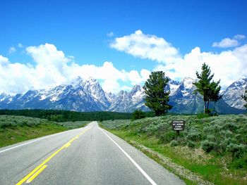 Country road passing through landscape