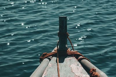 High angle view of rope tied on boat in sea