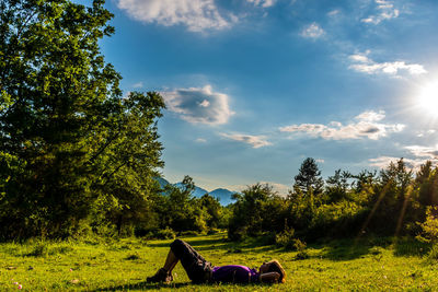 Man on field against sky