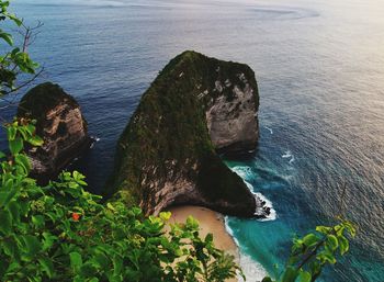 High angle view of rock formation in sea