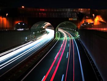 High angle view of light trails on road at night