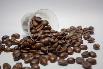 Close-up of coffee beans on table